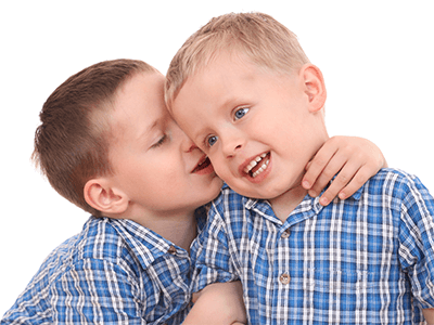 Picture of two boys cuddling