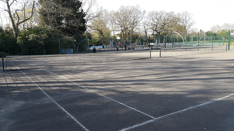 A close up of tennis courts at Waring Park