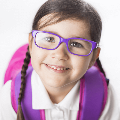 Picture of school girl wearing glasses and smiling