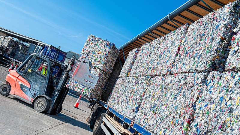 Recycling bales being loaded on to a lorry