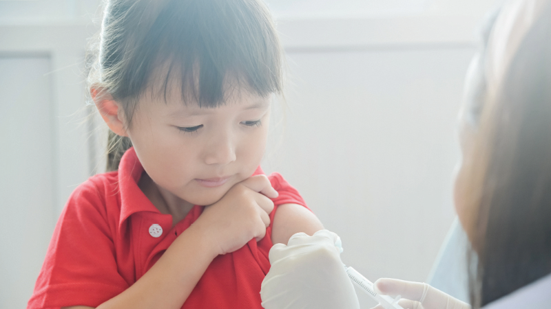 child getting vaccine