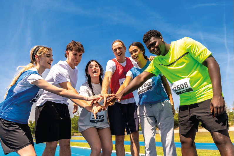 group of adults smiling