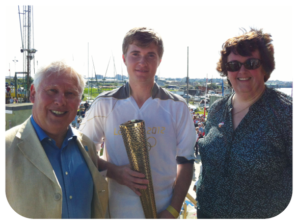 holding the Olympic torch