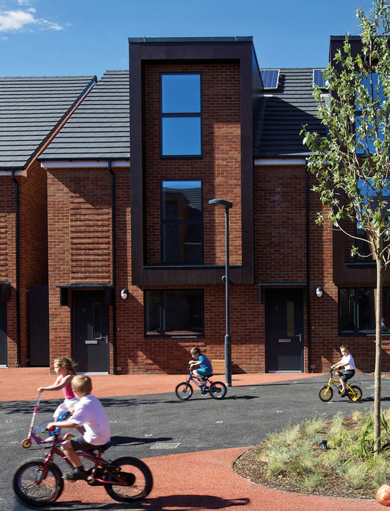 A decorative image of a group of kids playing outside