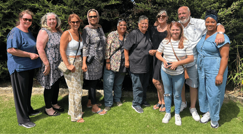 A group of people posing for a photo