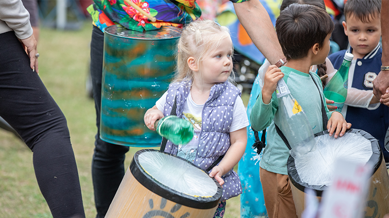 A child playiing a drum