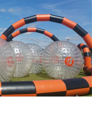 Kids enjoying a zorbing activity