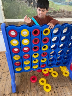 Child taking part in a HAF activity