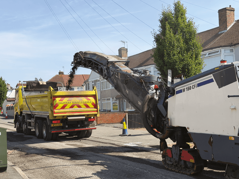 Photo of road works trucks repairing roads in Bexley