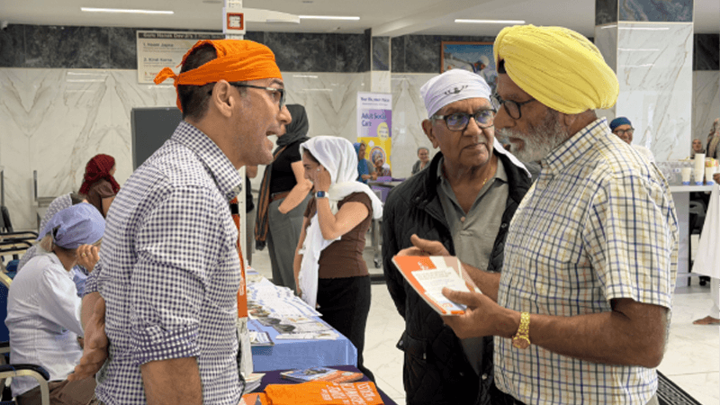 Carers talking to the voluntary sector at marketplace event