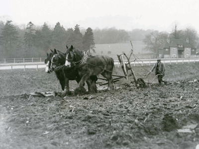 Photo of farmer ploughing land near the by-pass at Frognal, 1935