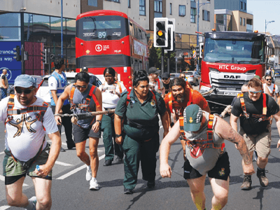 Image of the people taking part in the Truck Pull