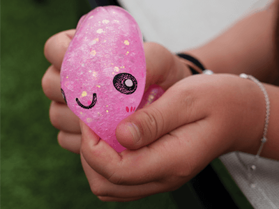 Photo of a person holding a squishy toy