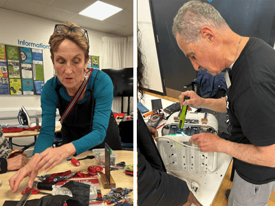 Photo of repair cafe volunteers mending textiles and fixing a toaster