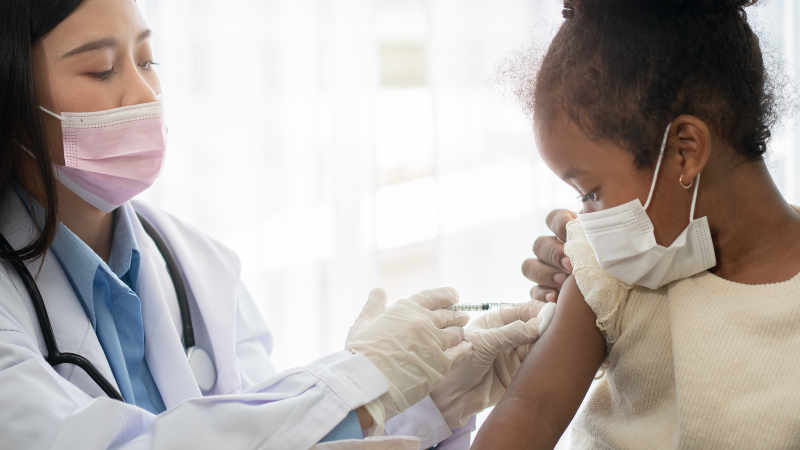 Image of a child getting a vaccination