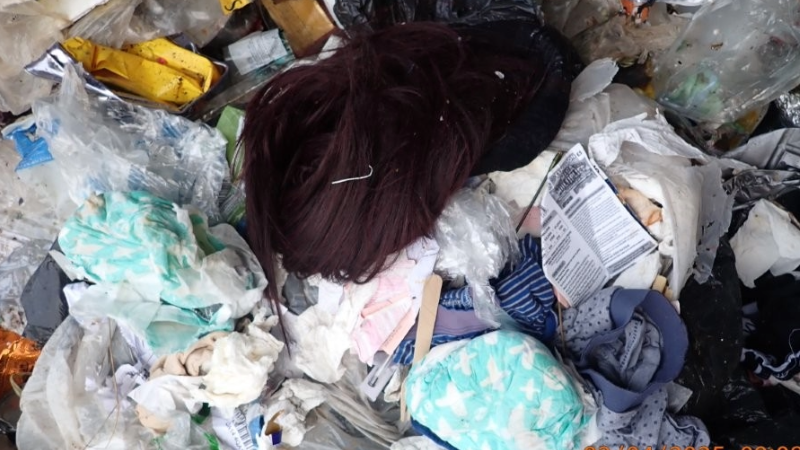 nappies and plastic bags contaminating white lidded bins