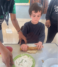 A child making a sandwich