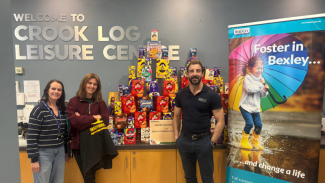 The team with donations at Crook Log