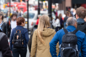 Decorative image of people walking on a high street