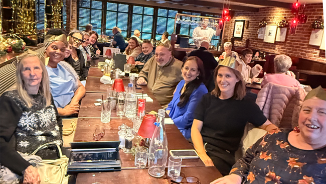 fostering team having dinner