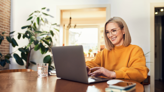 Picture of person working on a laptop