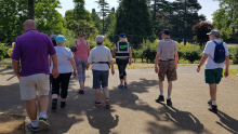 Group of people walking outdoors as part of group