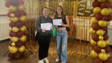 Townley Students, O Caushllarii and C Cunningham holding their results