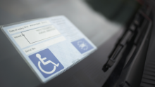 Image of a blue badge in a car windscreen