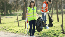Image shows several people litter picking