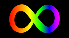 Rainbow infinity logo on black background
