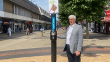 Councillor Diment showing one of the new Smartbins in Bexleyheath Broadway
