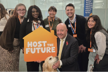 host and support team at event