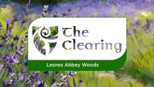 Image of green space with the words 'The Clearing' on it.